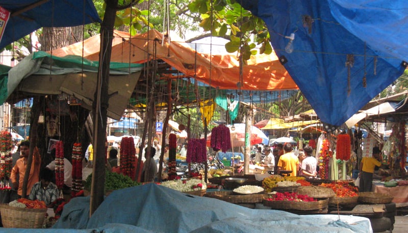 Flower sellers in a market in Bengaluru