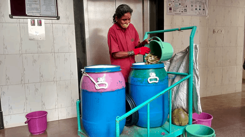 housekeeping staff segregating waste
