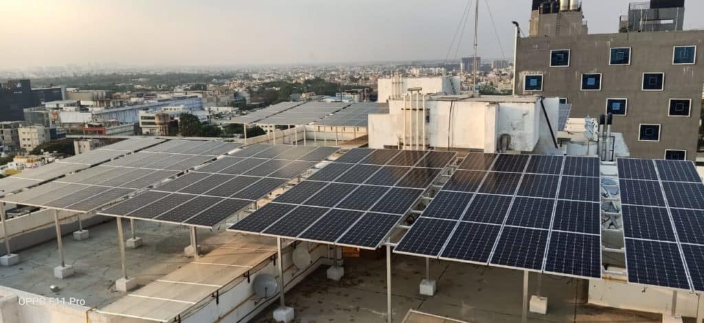 Solar panels installed on the rooftop of Trifecta Starlight apartment, Mahadevapura