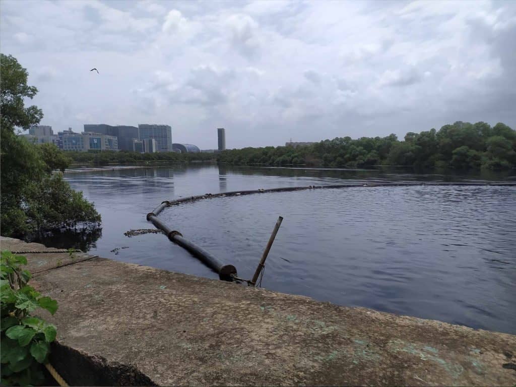 booms placed at Mithi river to prevent floating garbage