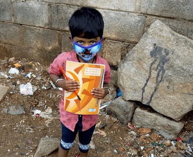 A child holding books