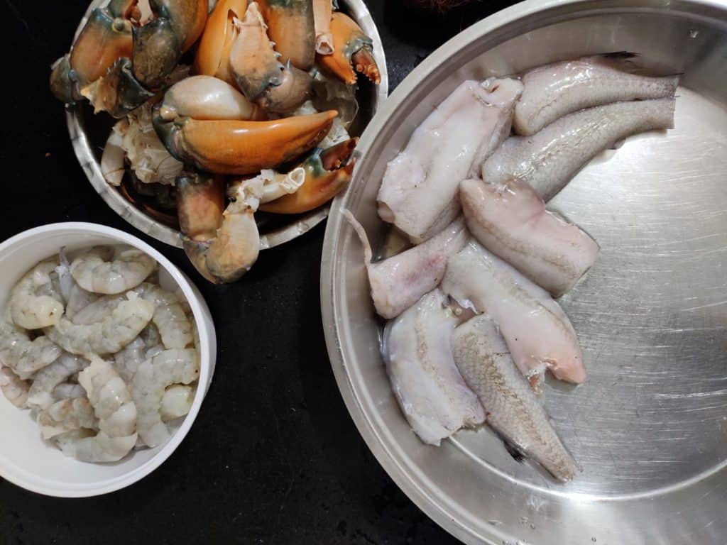Bombay duck or Bombil, Prawns or Kolambi, and Crabs in plates