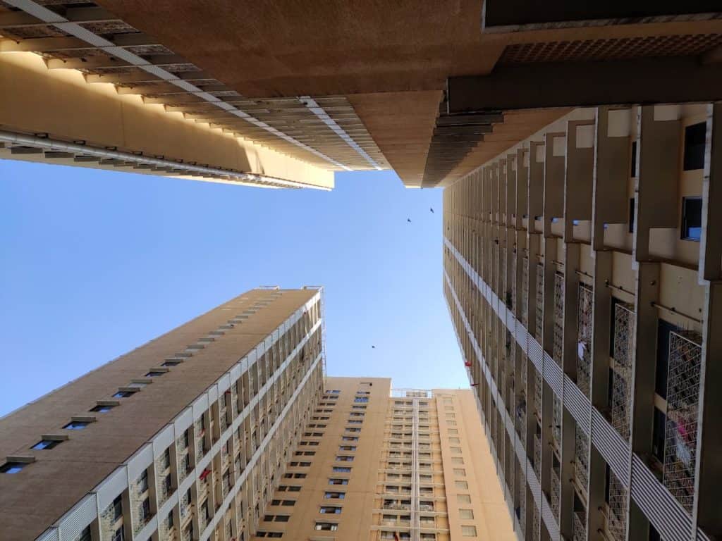 Tall buildings reach high above