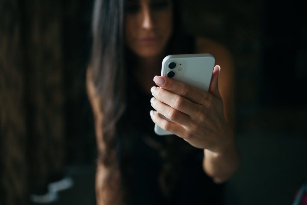 closeup of woman holding a phone