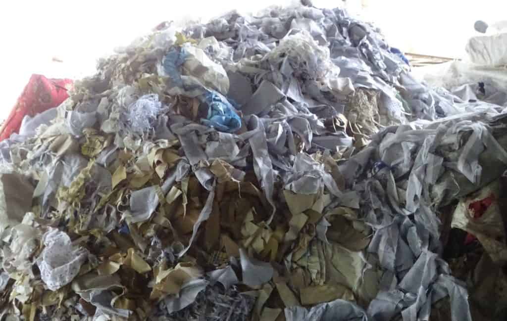 Mounting textile waste