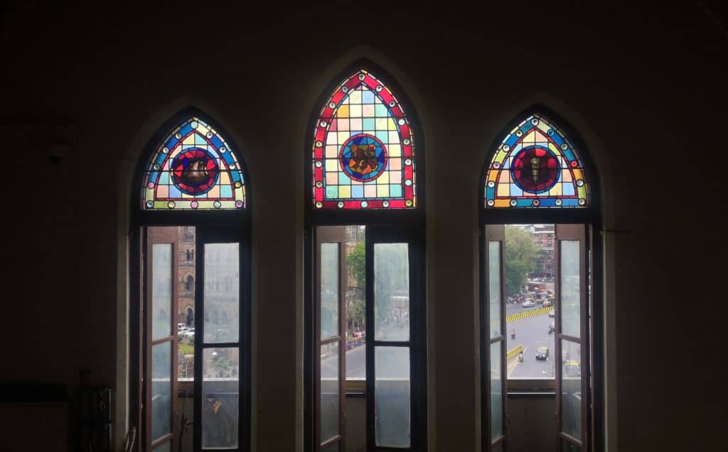 Stained glass windows of the BMC building looking out onto the roads ahead