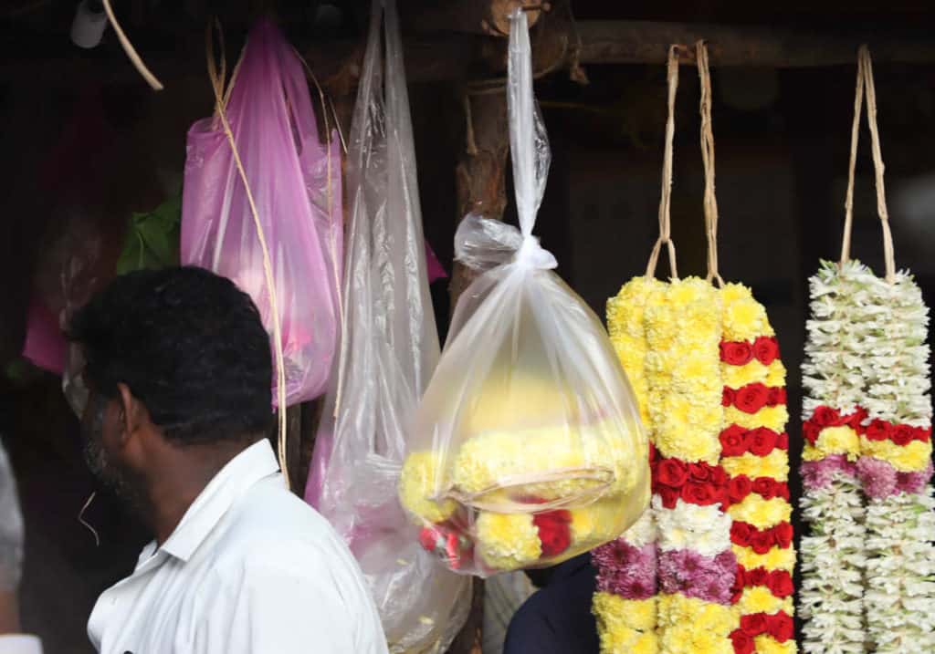 Flowers in a plastic bag at a roadside shop in Chennai