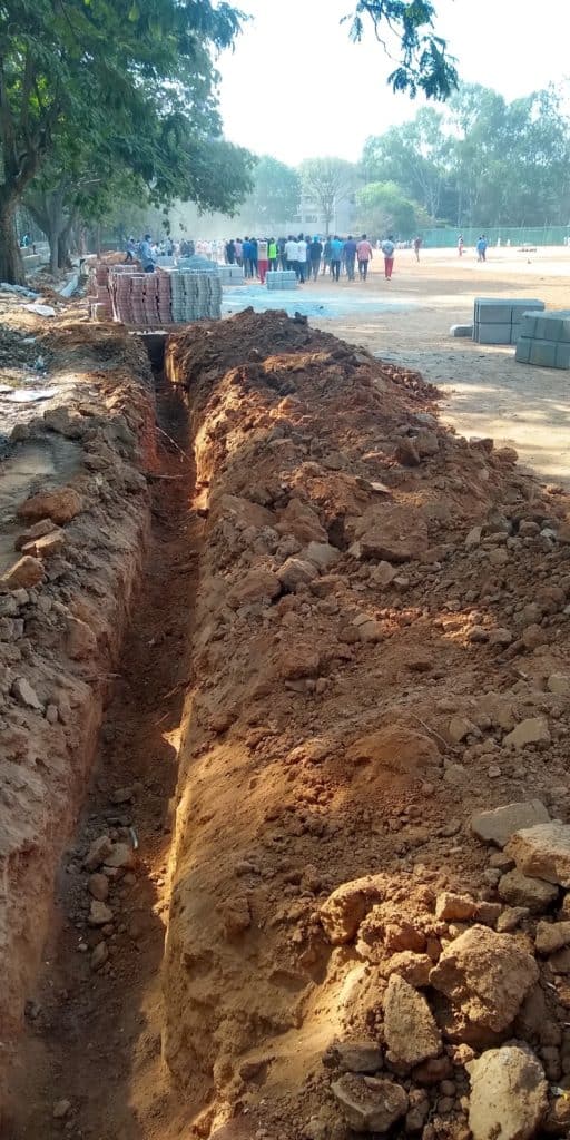 a ditch being dug at Malleshwaram 18th cross grounds