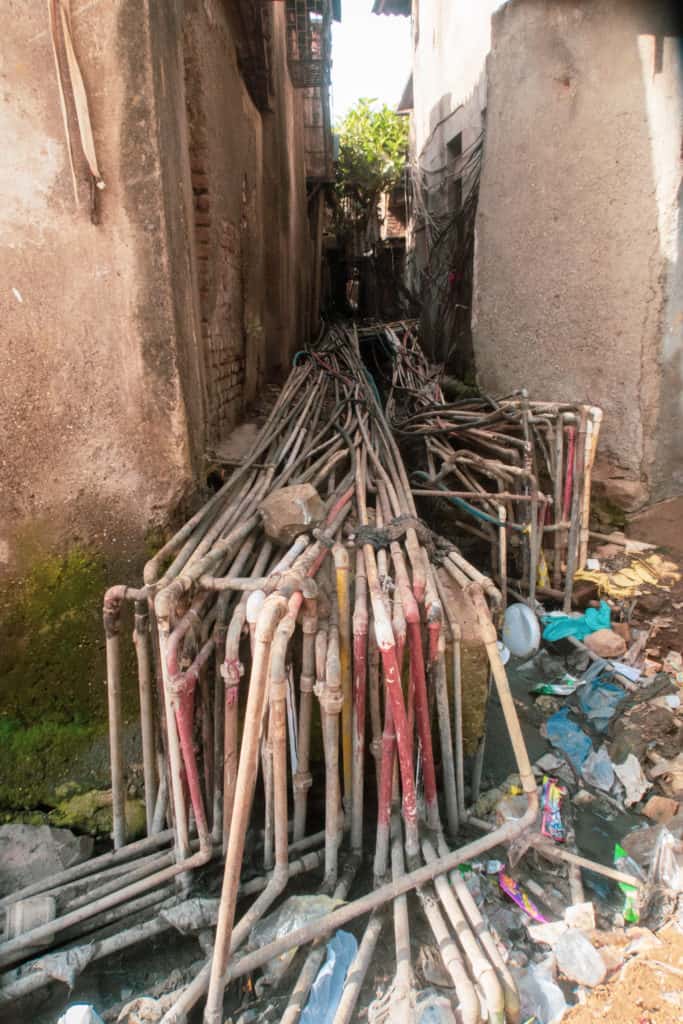 Sphagetti pipes connecting slum houses to a water line