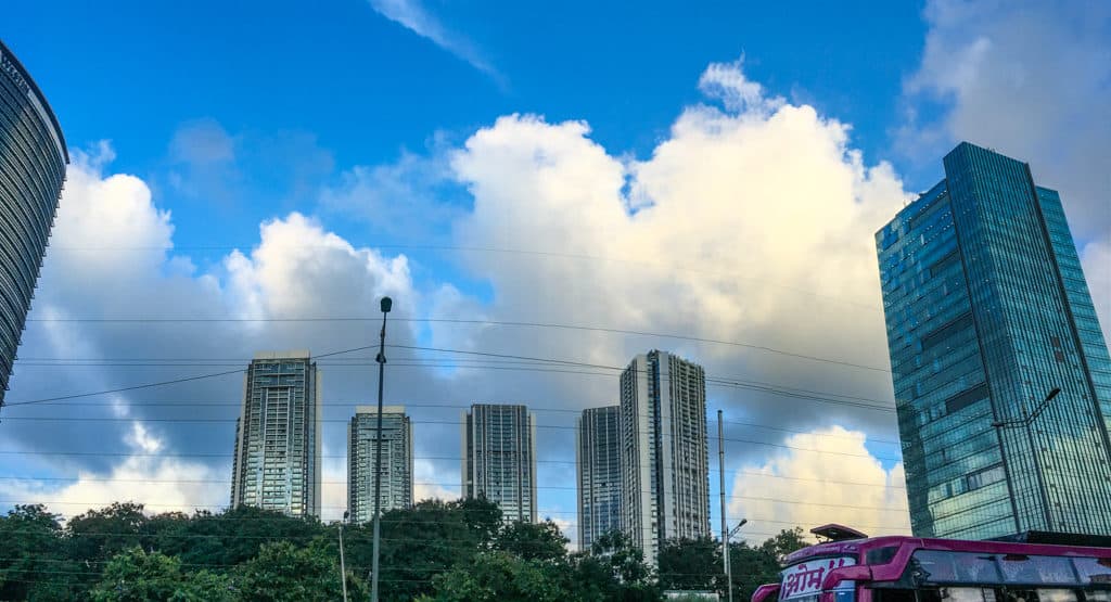 view of the sky in mumbai, with high rise and buildings