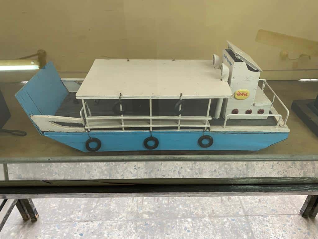 A blue BEST boat which resembles the modern day ferry.