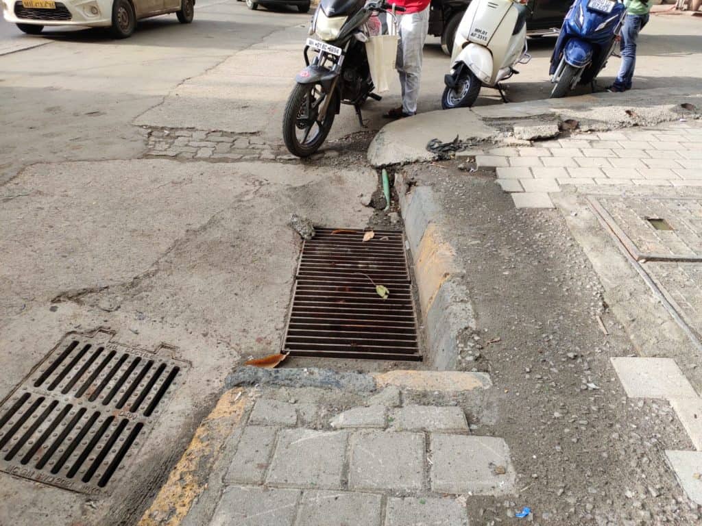 drains built a feet lower than the road road level in hindmata, parel