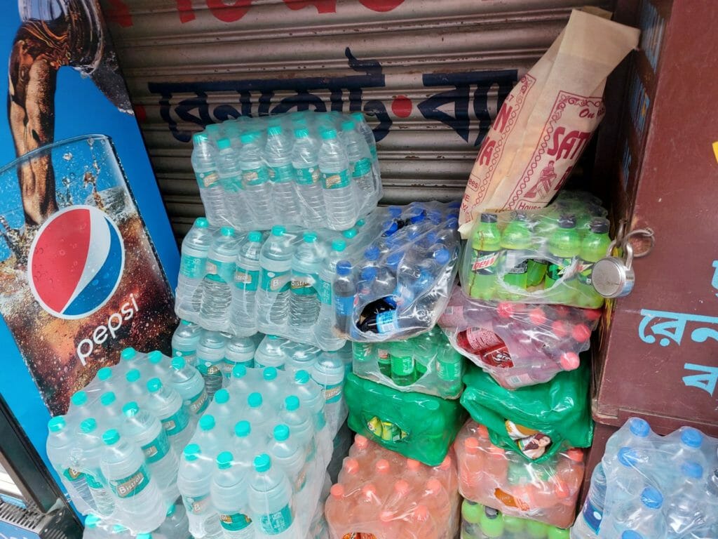 Plastic bottles at a stall outside a Puja pandal
