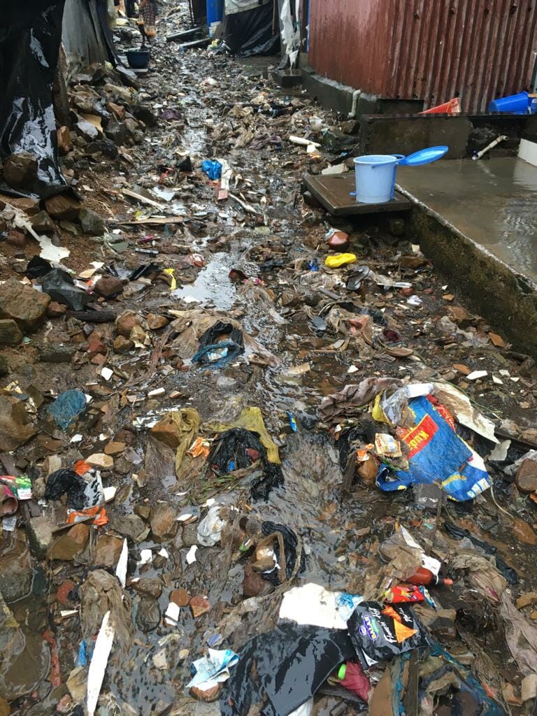 Narrow gullies filled with garbage