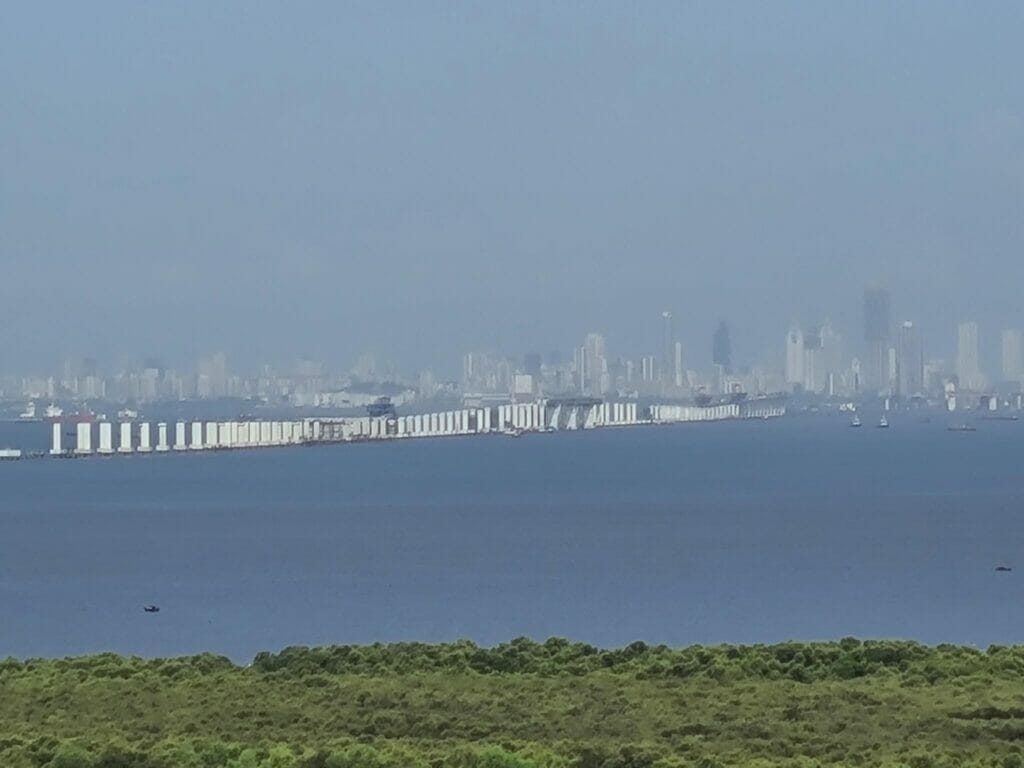 A view of the Mumbai skyline in the backdrop of the ongoing construction of the MTHL
