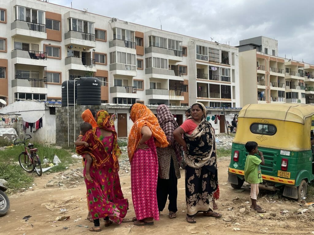 Women belonging to the poorer settlements in Whitefield, Bengaluru, at the relief distribution following the September 2022 rains in Bengaluru
