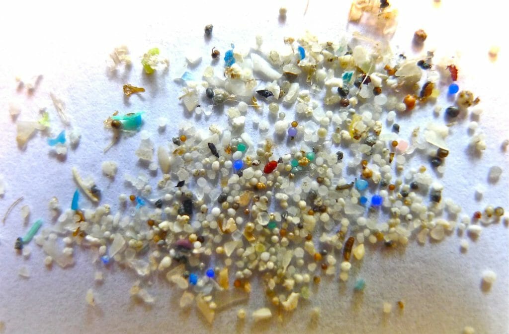 Small microplastics particles of different colours