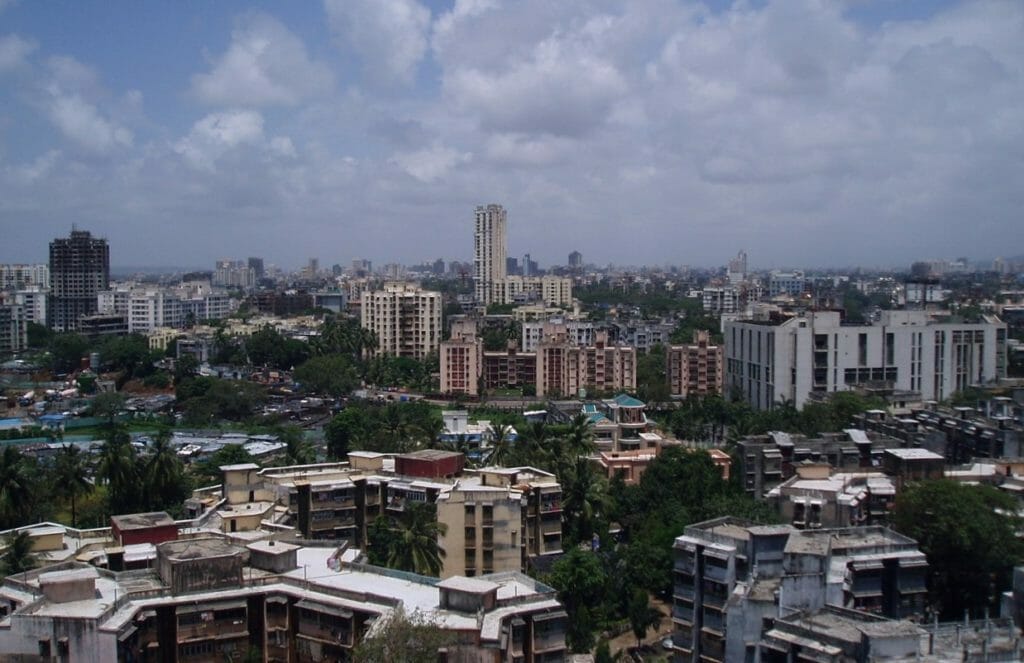 A skyline of Mumbai, dense short buildings and a few standout tall ones, depicting the effect of FSI in Mumbai