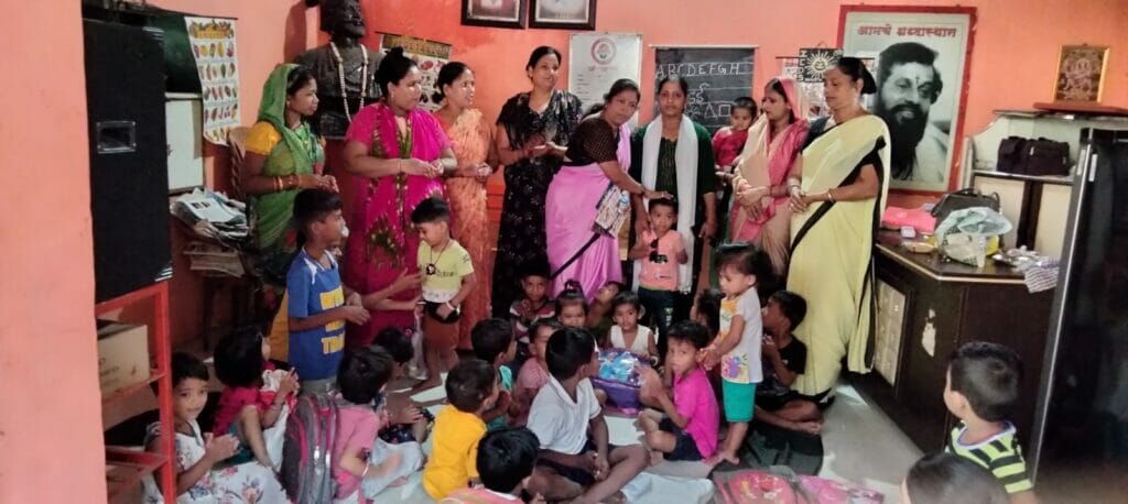 Anganwadi induction programme in the presence of anganwadi worker and helper