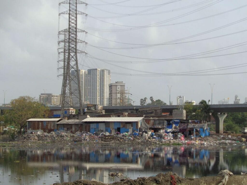 Scrap shops built on the banks of the river