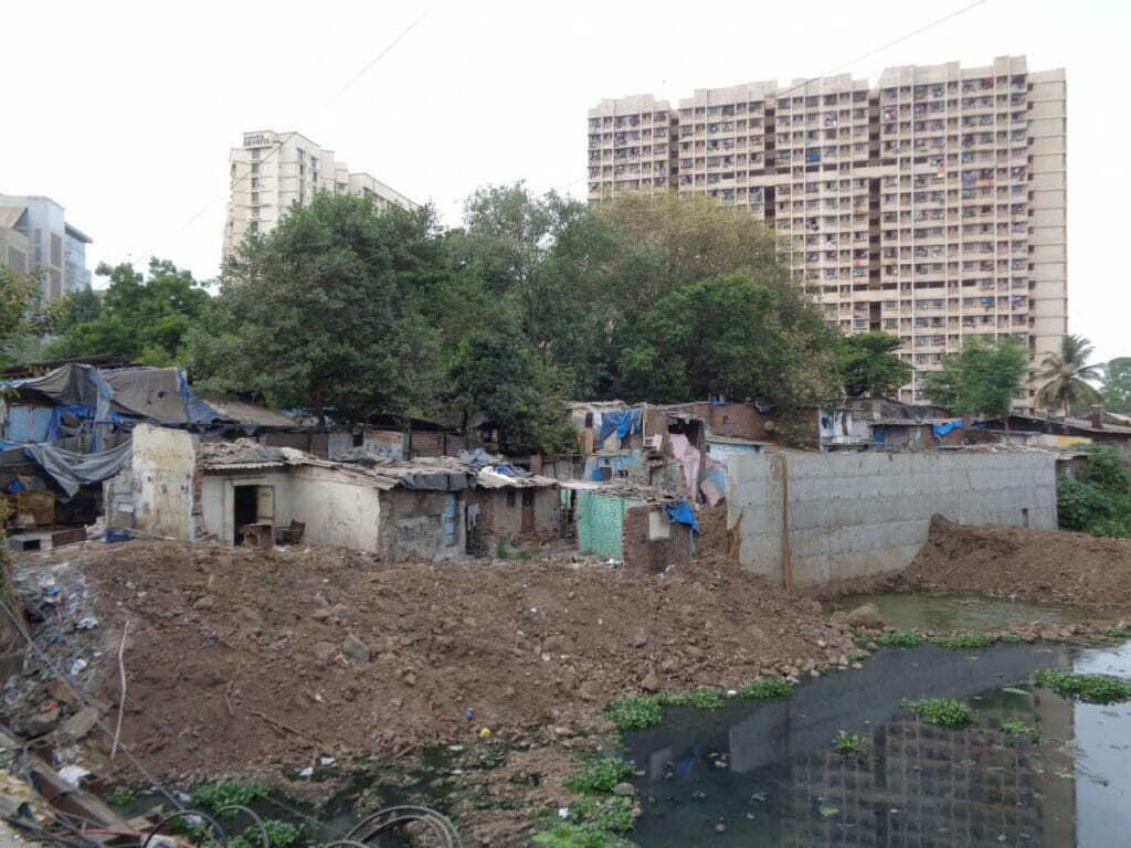 demolished slums on the banks of Mithi river