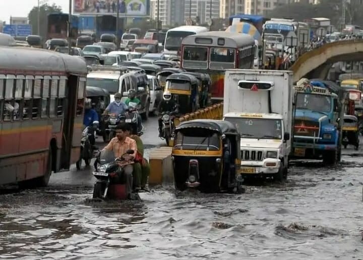 Vehicles on a waterlogged road 