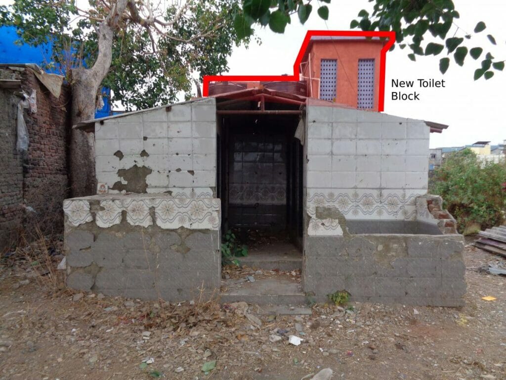 community toilets built along Mithi river at Shivaji Nagar 