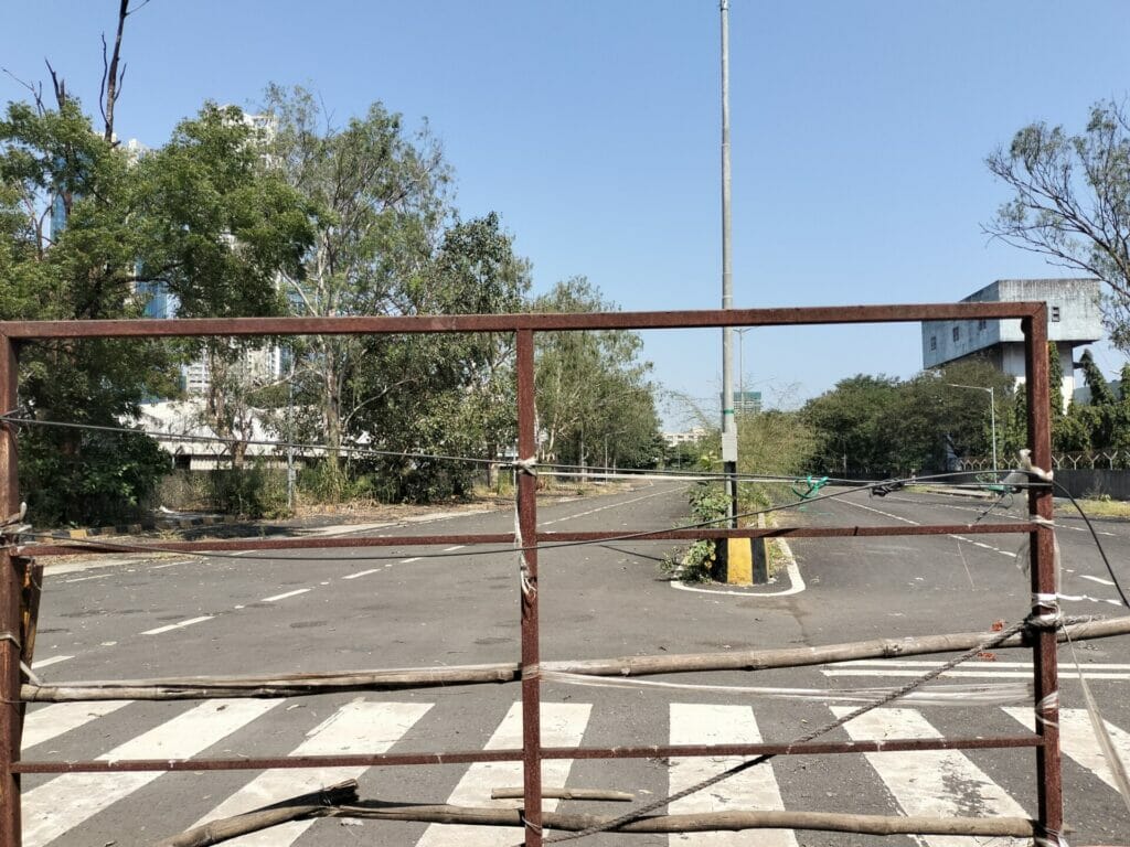 An empty road behind barricades