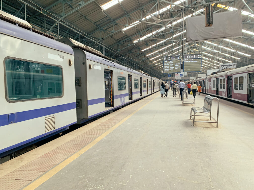 A platform at Churchgate railway station with an AC train in Mumbai