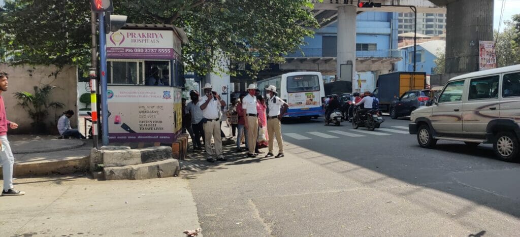 Traffic policemen at Goraguntepalya signal. 