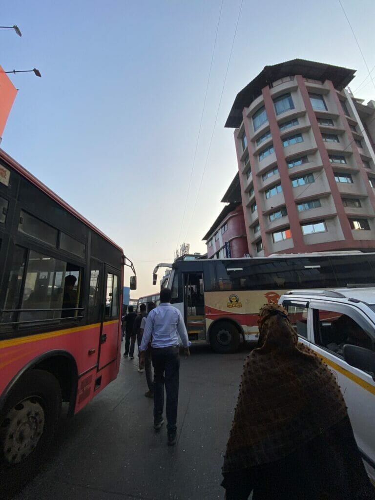 thane traffic and people walking in between vehicles