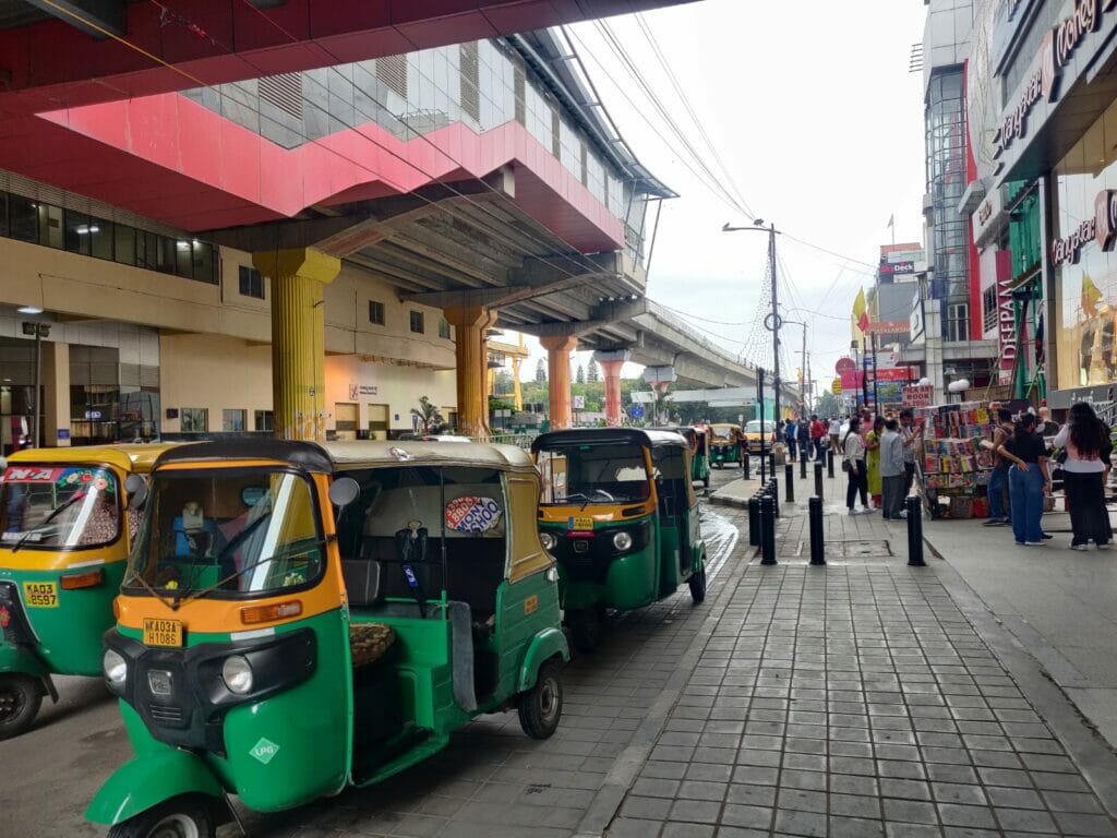 Autos lined up outside MG Road metro station
