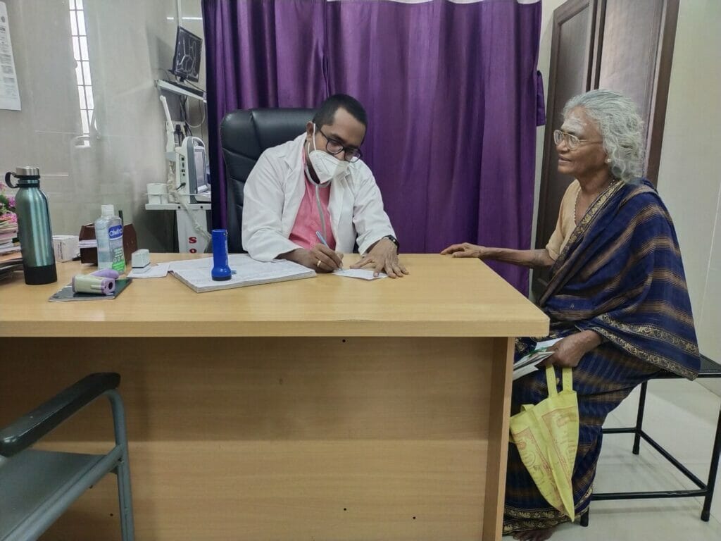 doctor at the urban primary health center in Valasavakkam, Chennai, treating a patient