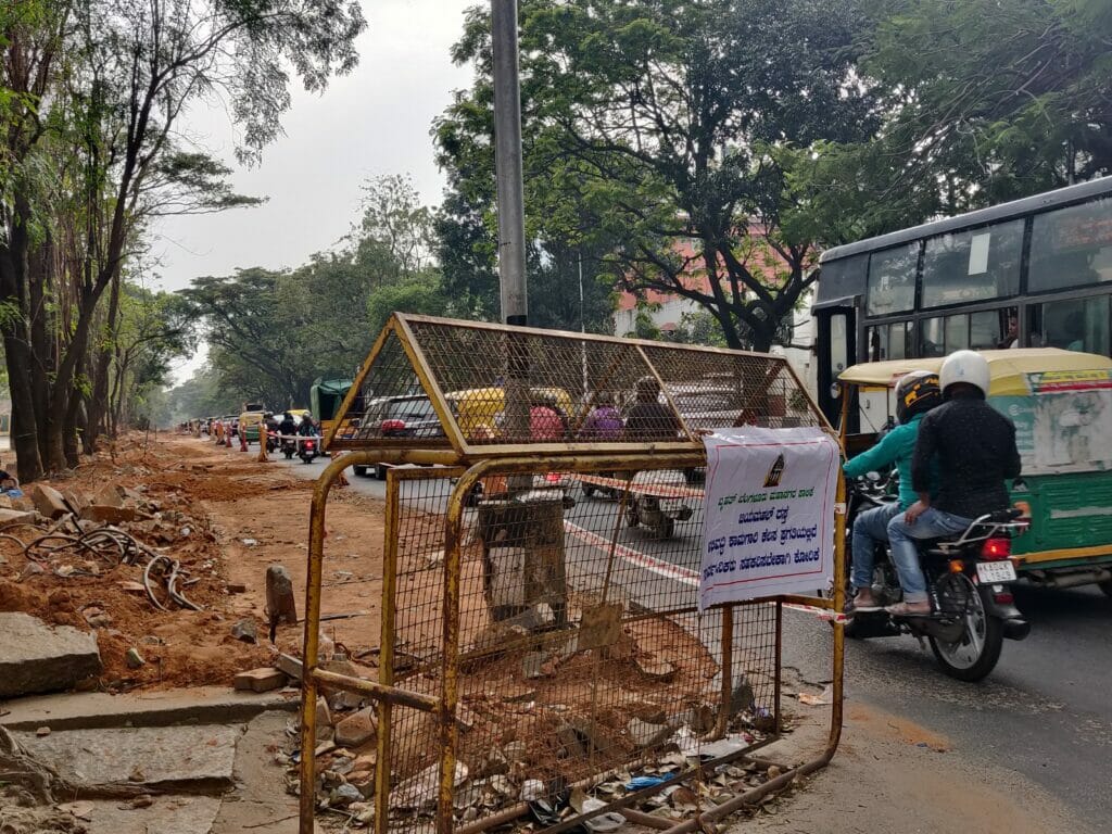 A stretch of road, in front of Palace Grounds, under construction for the Bellary Road widening project. 