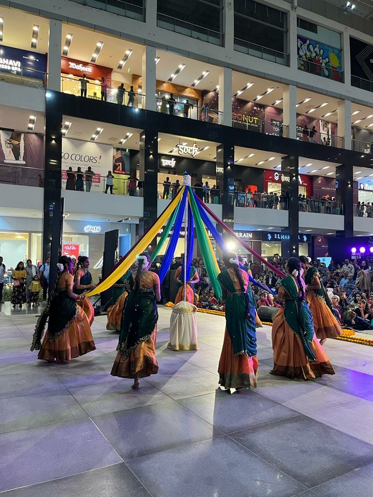 Dancers performing in a mall
