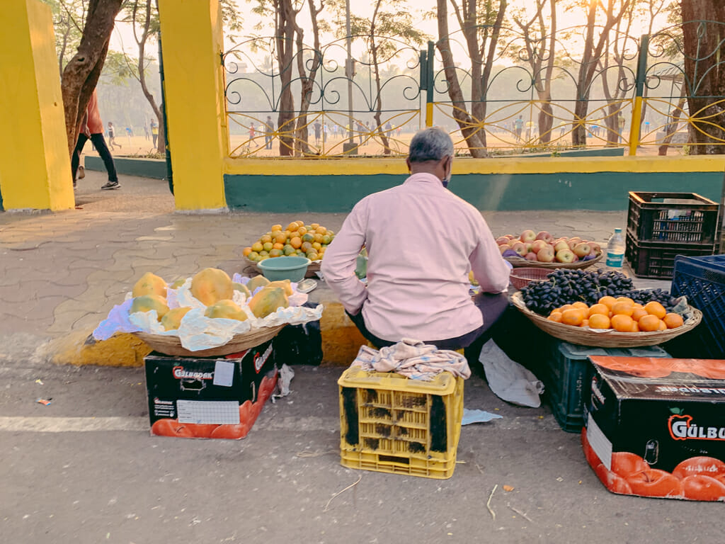 Man selling fruits on the roadside
