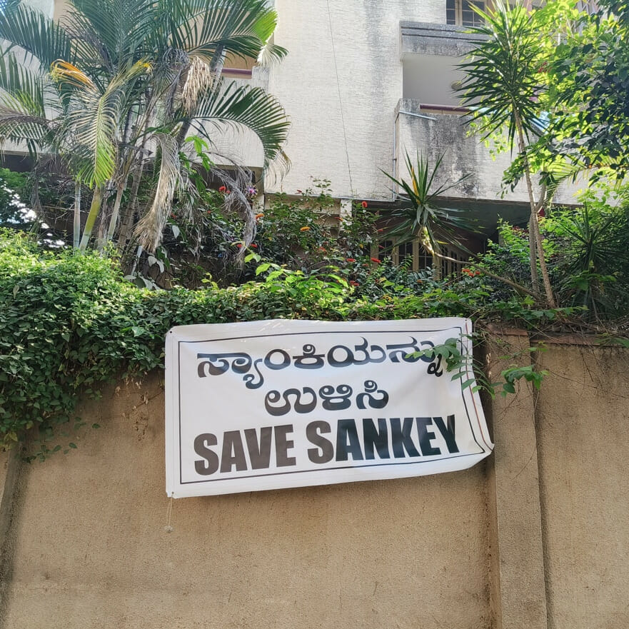 A Save Sankey poster on a building. 