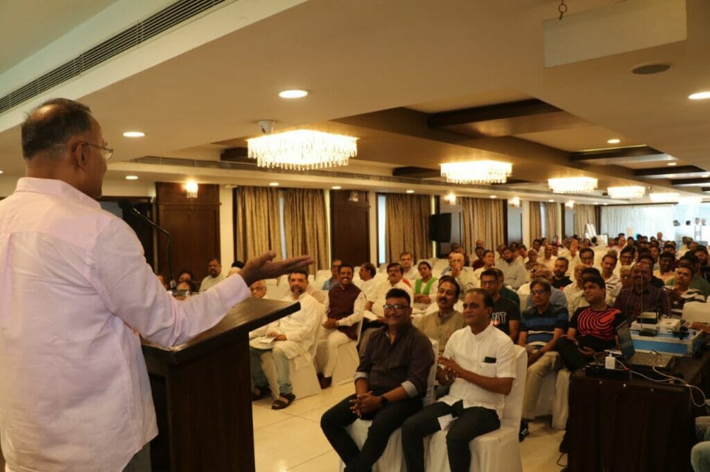 MLA Dinesh Gundu Rao speaking with Gandhinagar residents