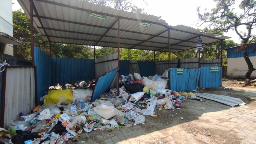 mrf with dry waste piling out on the road