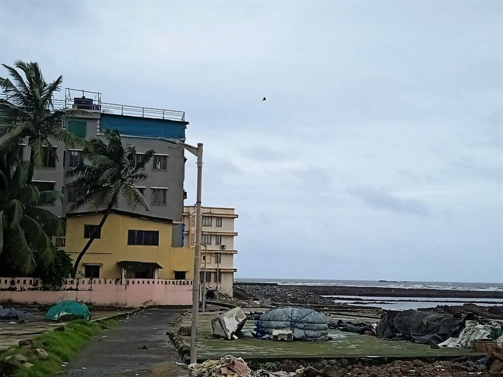 Buildings including more than four-storey, built at the edge of the coast, in Madh island