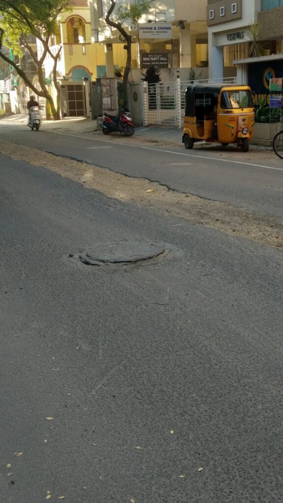 damaged road in thiruvanmiyur