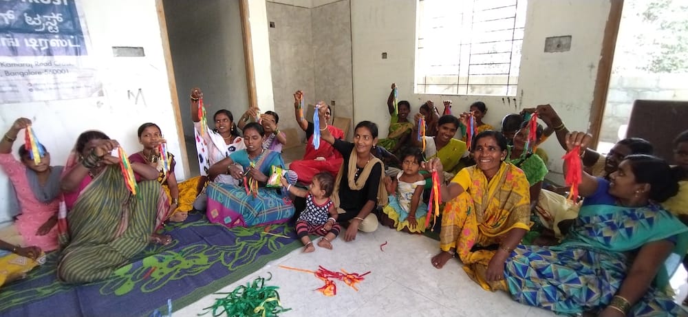 Slum women and children participating in a workshop
