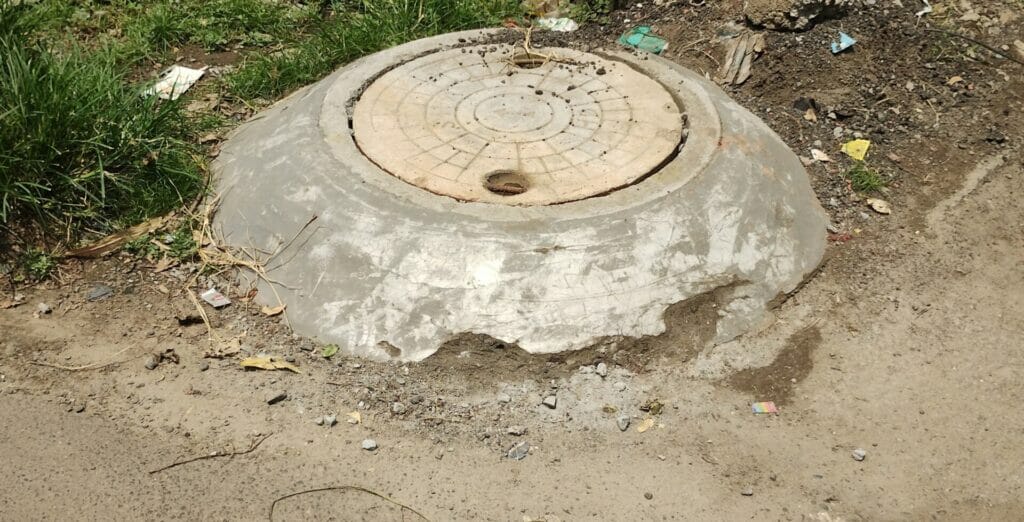 raised manhole chamber after civic work in chennai
