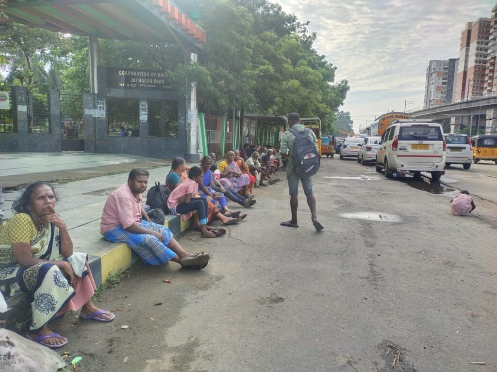 workers sitting on pavement