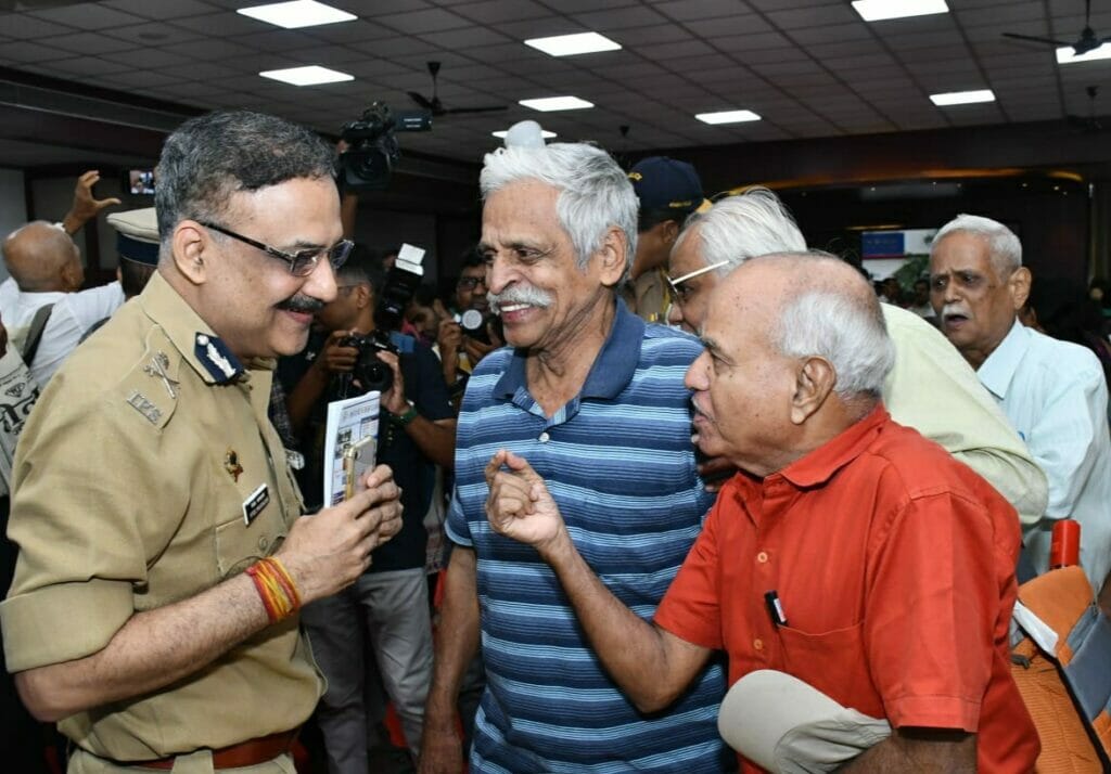 Mumbai police chief Vivek Phansalkar interacting with senior citizens at a meeting organised for them.