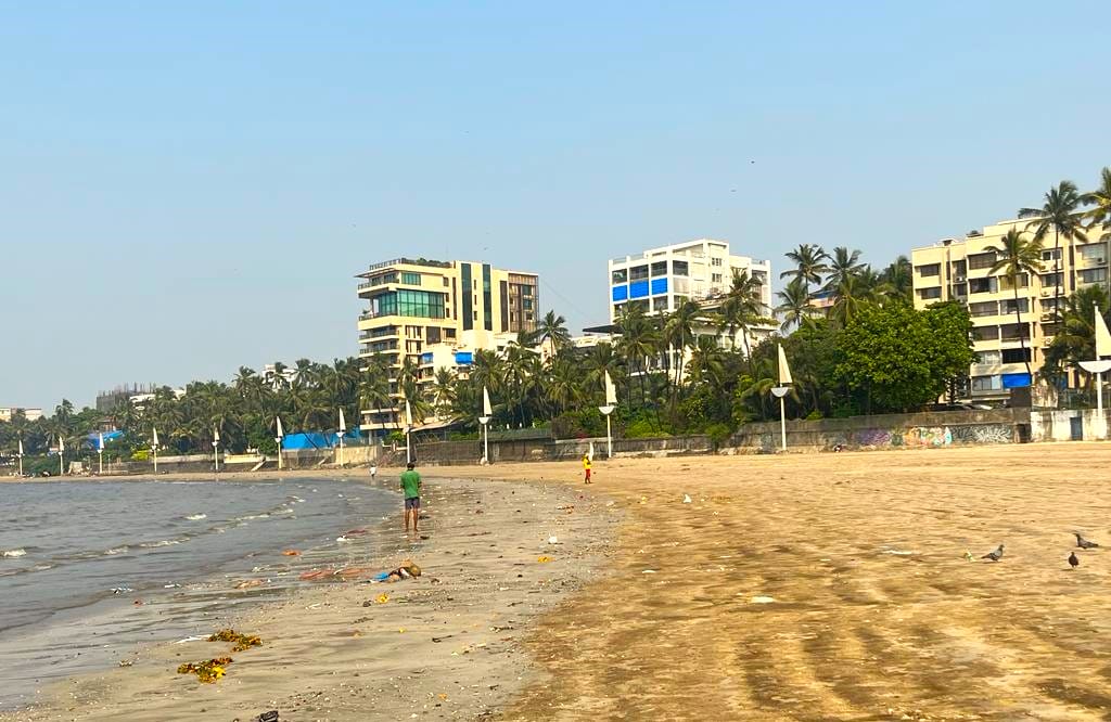 Buildings constructed along polluted Juhu beach in Mumbai