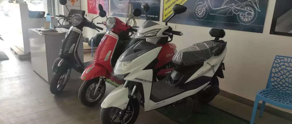 electric two wheelers in a showroom in Guindy