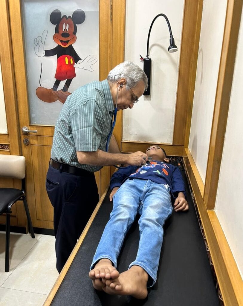 doctor checking a child patient 