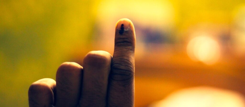 ink mark on a finger, indicating voting