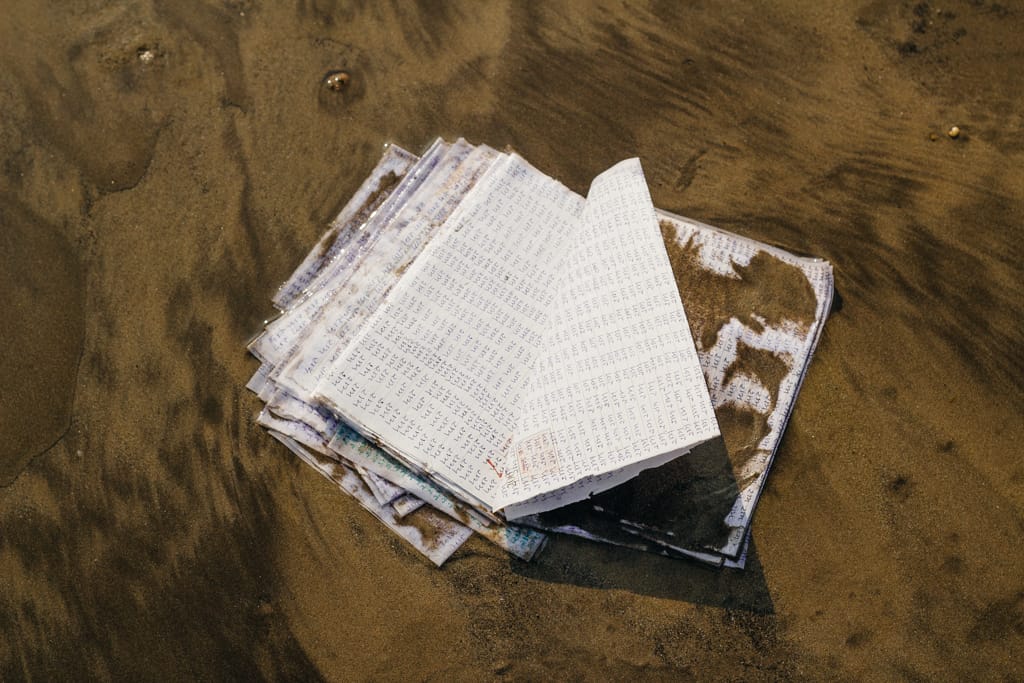 Discarded book on a beach